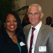 Nicole Colbert-Botchway, President of the Mound City Bar Association, with Gray Ritter Graham attorney Maurice Graham.