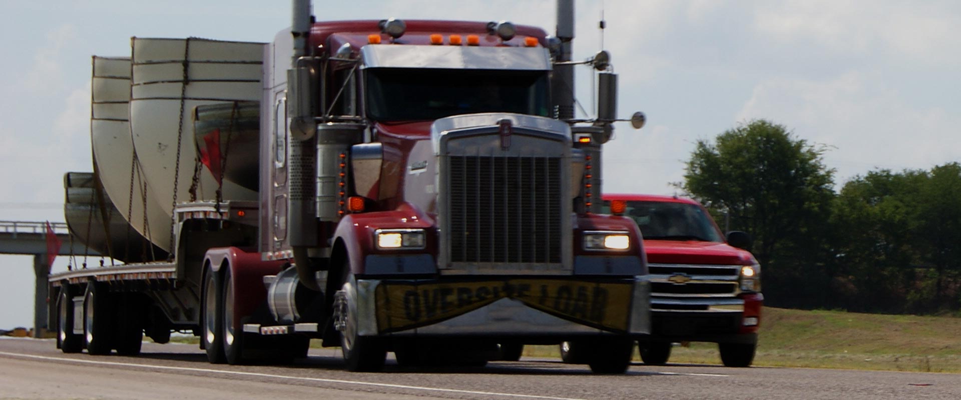 GRG overloaded trucks falling debris load shifting attorneys